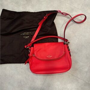 Coral colored Kate spade purse bag